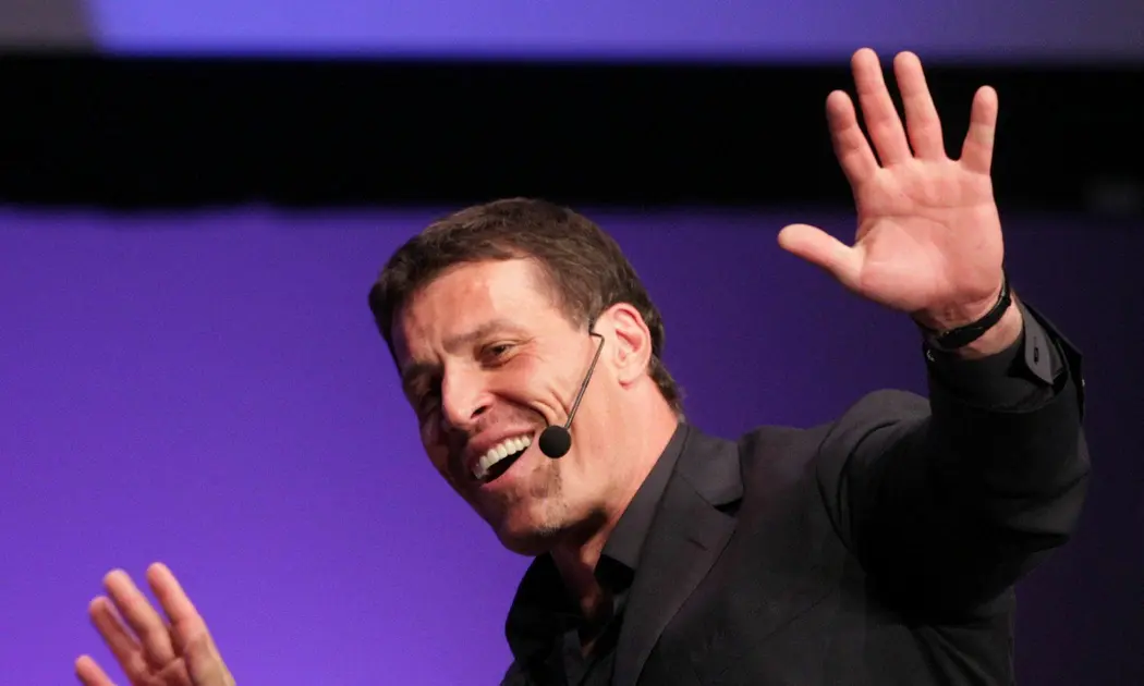 How much does it cost to book Tony Robbins?